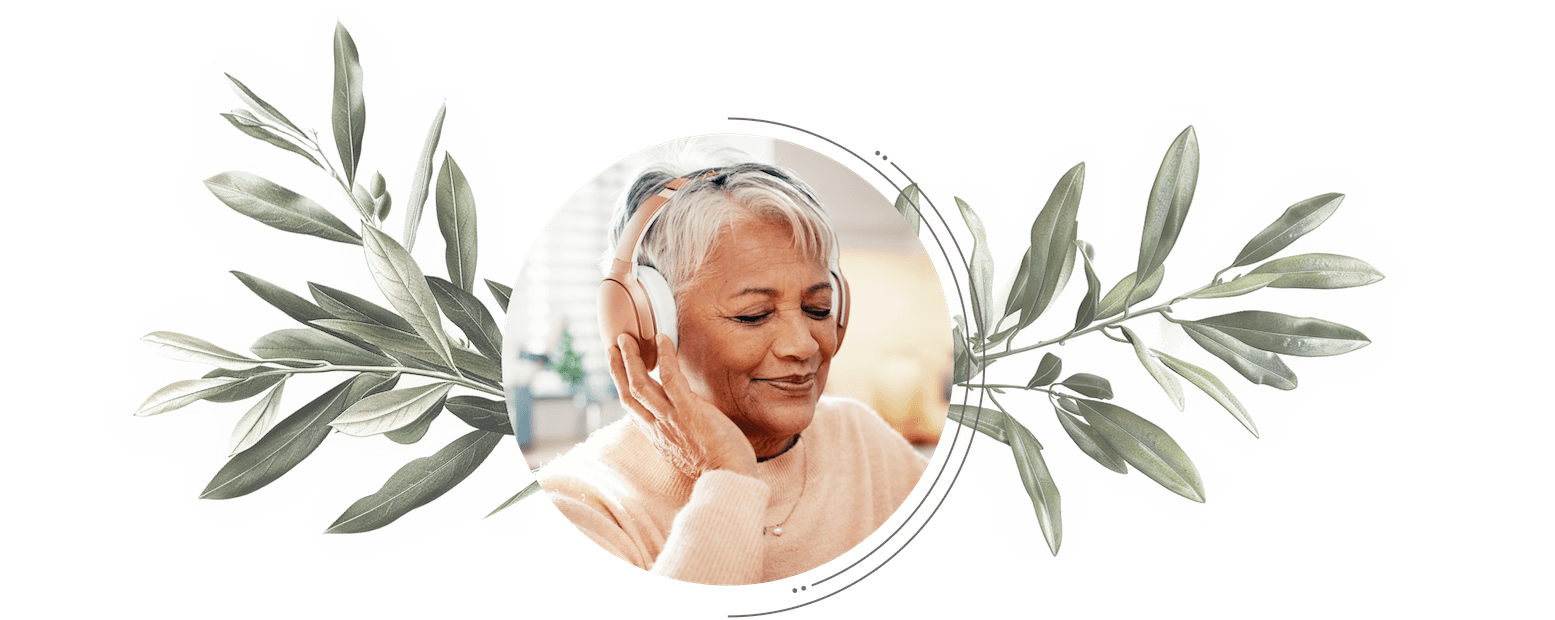 Grandmother listening on earbuds